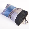 Item 003 : Pursat : Raw silk-panel jewellery bag. Internal zipped pockets. Wrap-around silk ties to close.