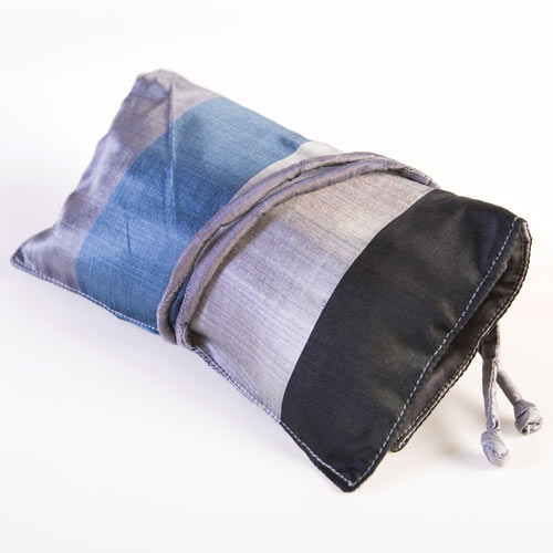 Item 003 : Pursat : Raw silk-panel jewellery bag. Internal zipped pockets. Wrap-around silk ties to close.